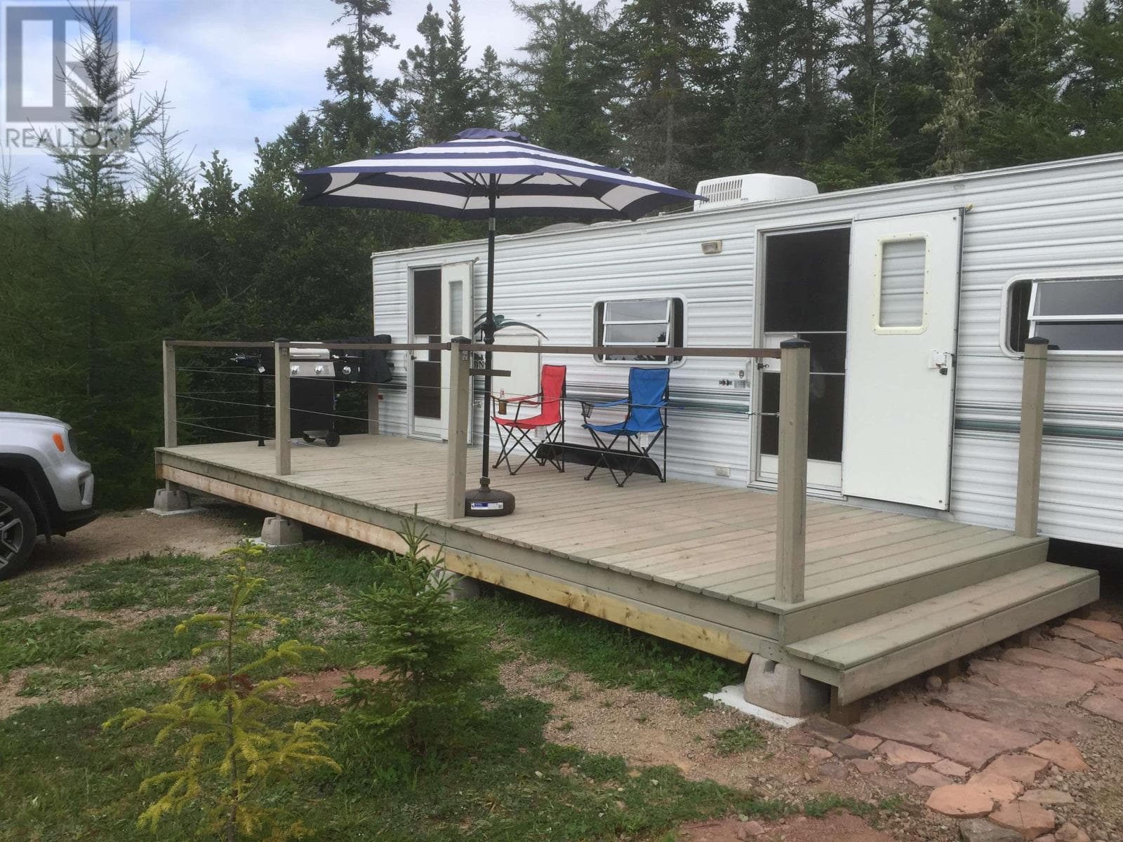 Serviced lot with well and trailer at MacMillan Lake, photo 2