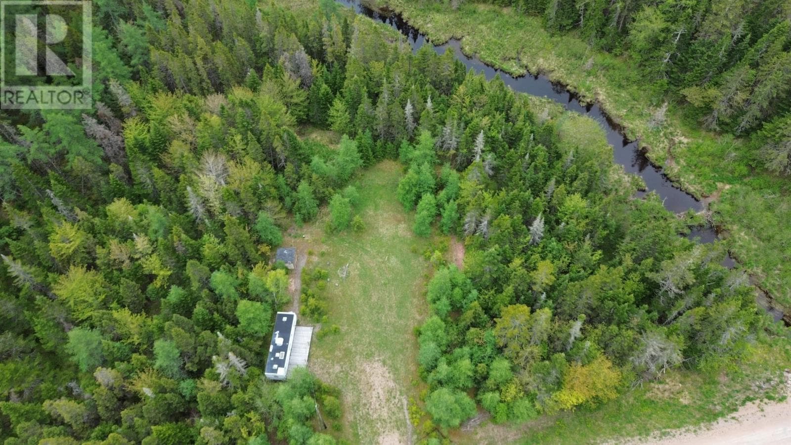 Serviced lot with well and trailer at MacMillan Lake, photo 8